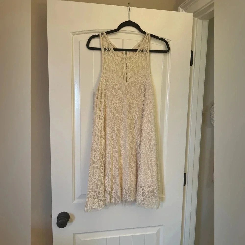 Altar’d State Lace Mini Dress. So many versatile layering options! Size Large.